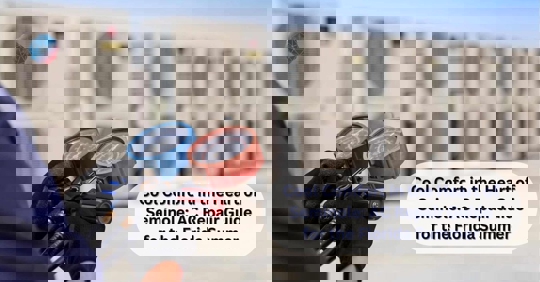 A technician checking AC outdoor units