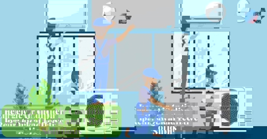 Two HVAC technicians working on an air conditioning unit