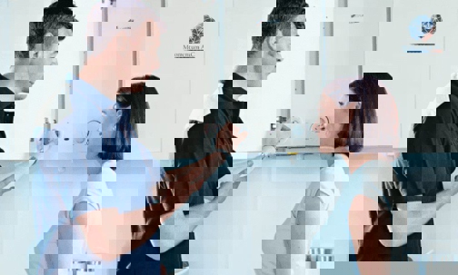 A technician talking to his client