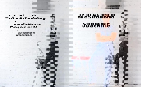 HVAC Technician beside a split-type AC.