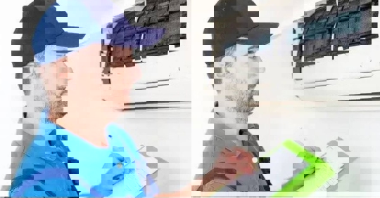 a technician checking the AC