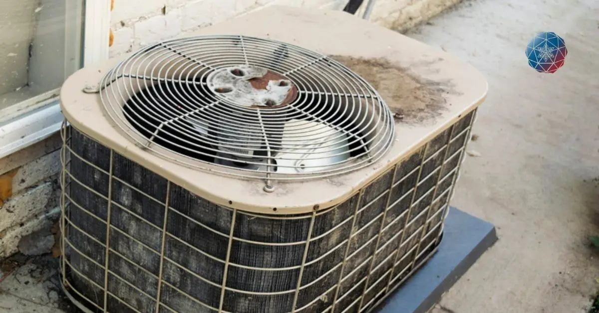 An old and broken AC outdoor unit